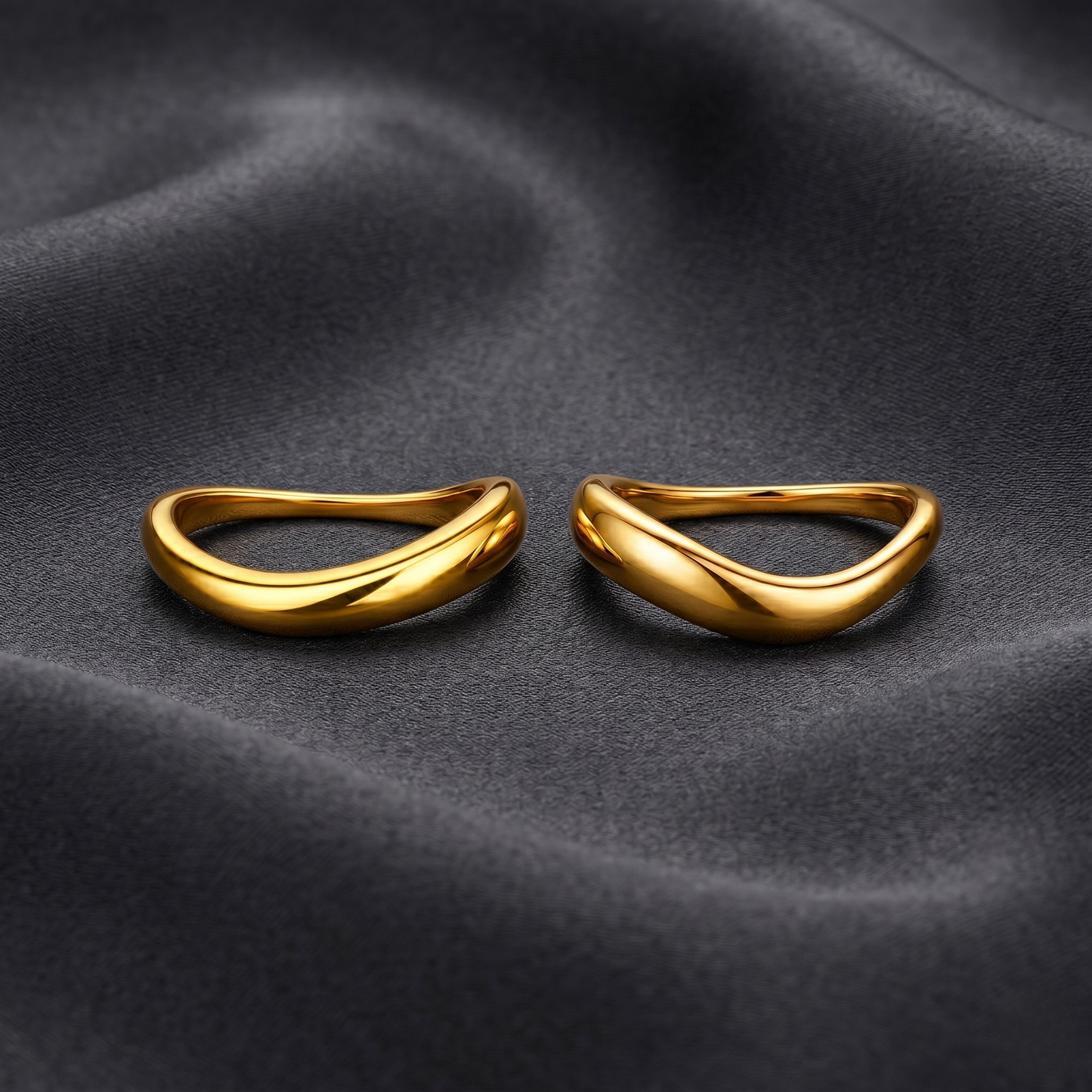 Macro shot displaying the high-polish 18K gold plated surface and fine craftsmanship.