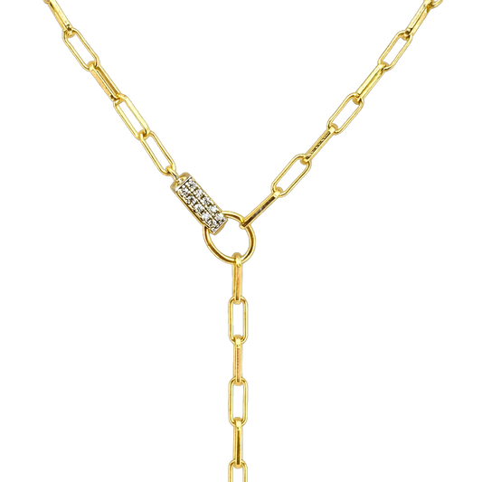 Close-up detail of zircon stones set in the paperclip drop pendant on this sterling silver 14K gold plated necklace. Fine jewelry craftsmanship and sparkle.