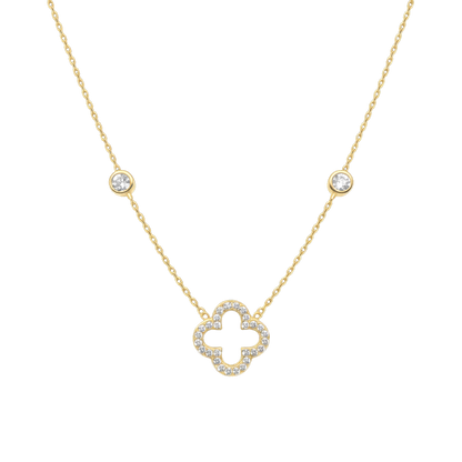Close-up of the clover pendant crafted from sterling silver, 14K gold plated, and set with sparkling zircon stones. A fine jewelry necklace designed for elegant everyday wear.