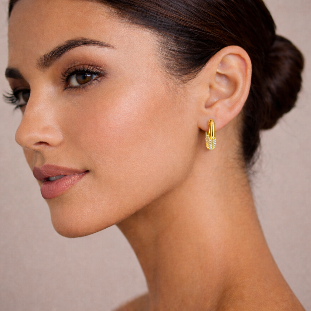 Close-up detail of 18K gold plated S925 earrings highlighting the brilliant zircon shine and refined craftsmanship. Elegant zircon hoop jewelry for everyday and occasion wear.