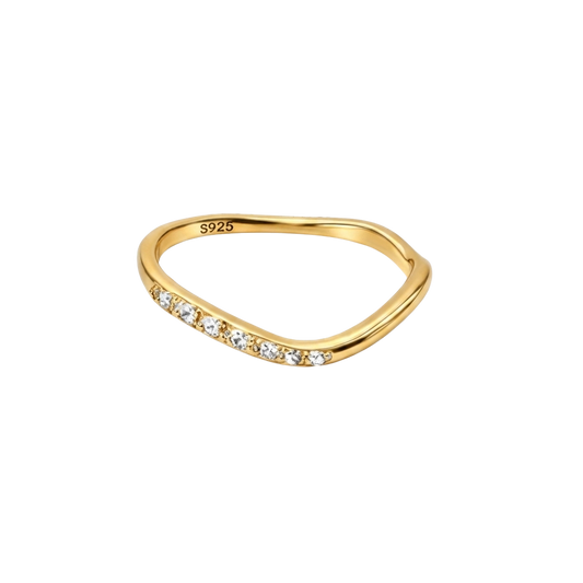 Macro shot focusing on the sparkling zircon stones set along the band.