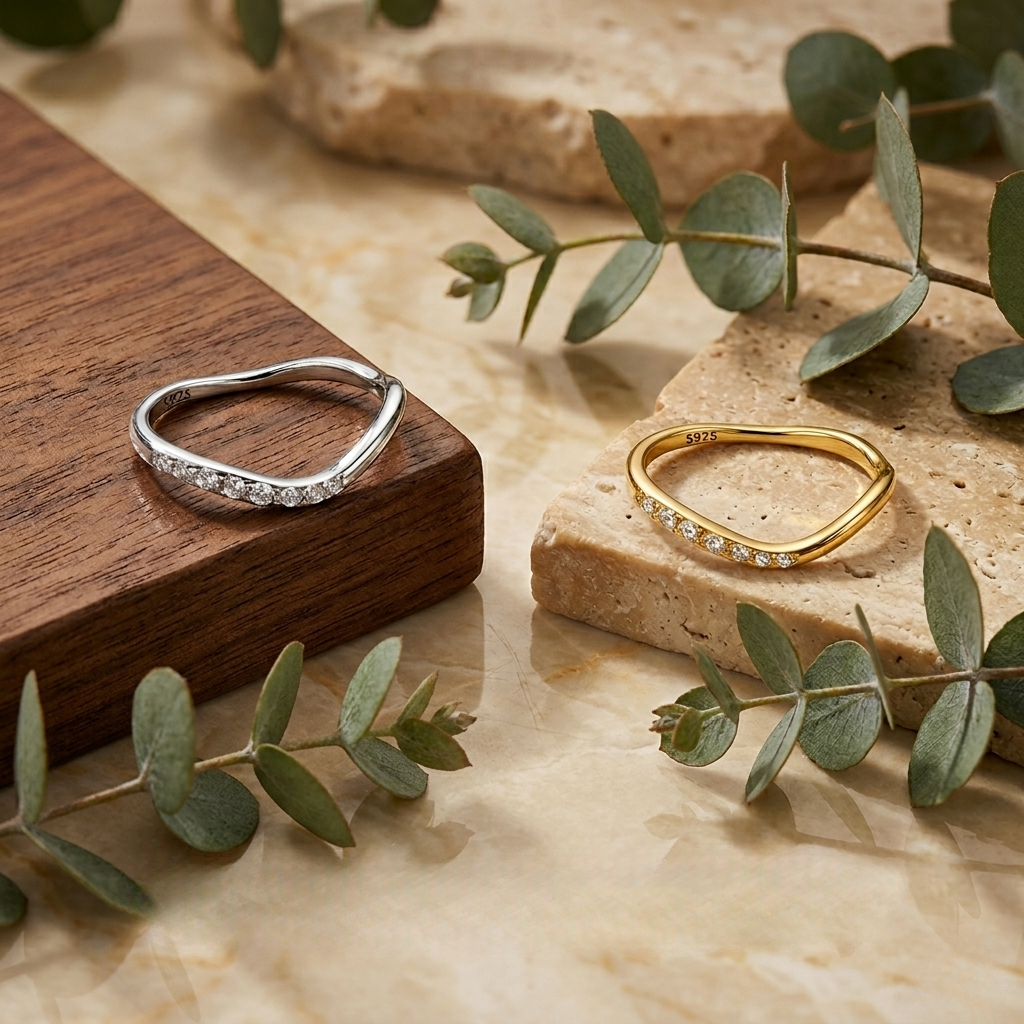 Lifestyle image showing the Alice ring stacked with complementary rings for a layered, modern aesthetic.