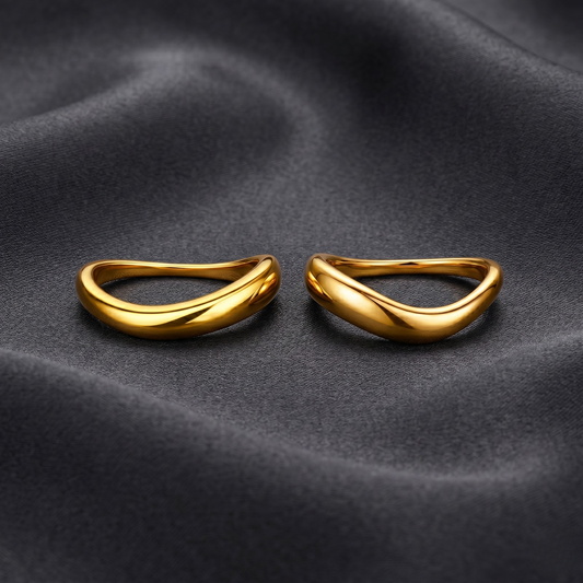 Macro shot displaying the high-polish 18K gold plated surface and fine craftsmanship.