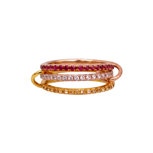Showcases the slim pavé zircon band design with radiant 18K gold plated finish, highlighting its minimalist stackable elegance.