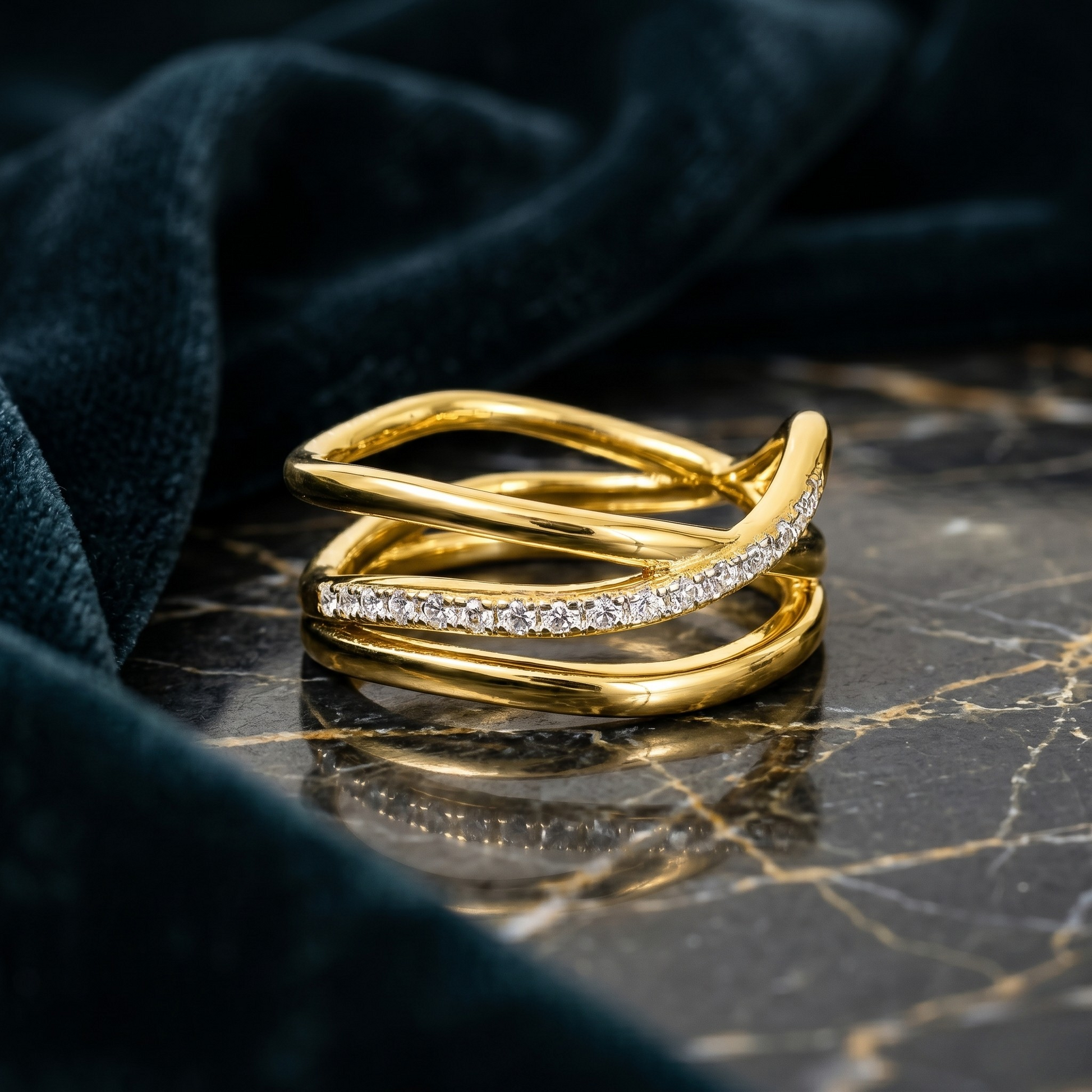 Studio-lit product image capturing the reflective shine and sculptural elegance of the Harper ring.