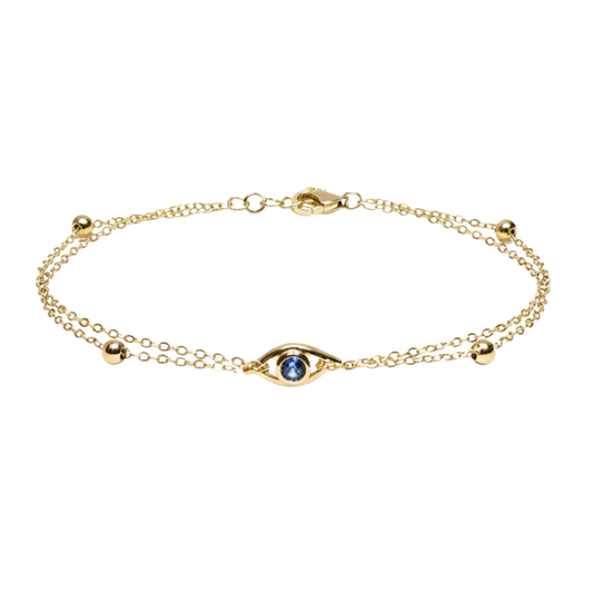 Full product image of the Lea S925 sterling silver bracelet with 14K gold plating, featuring a sleek evil eye design and double chain detail.