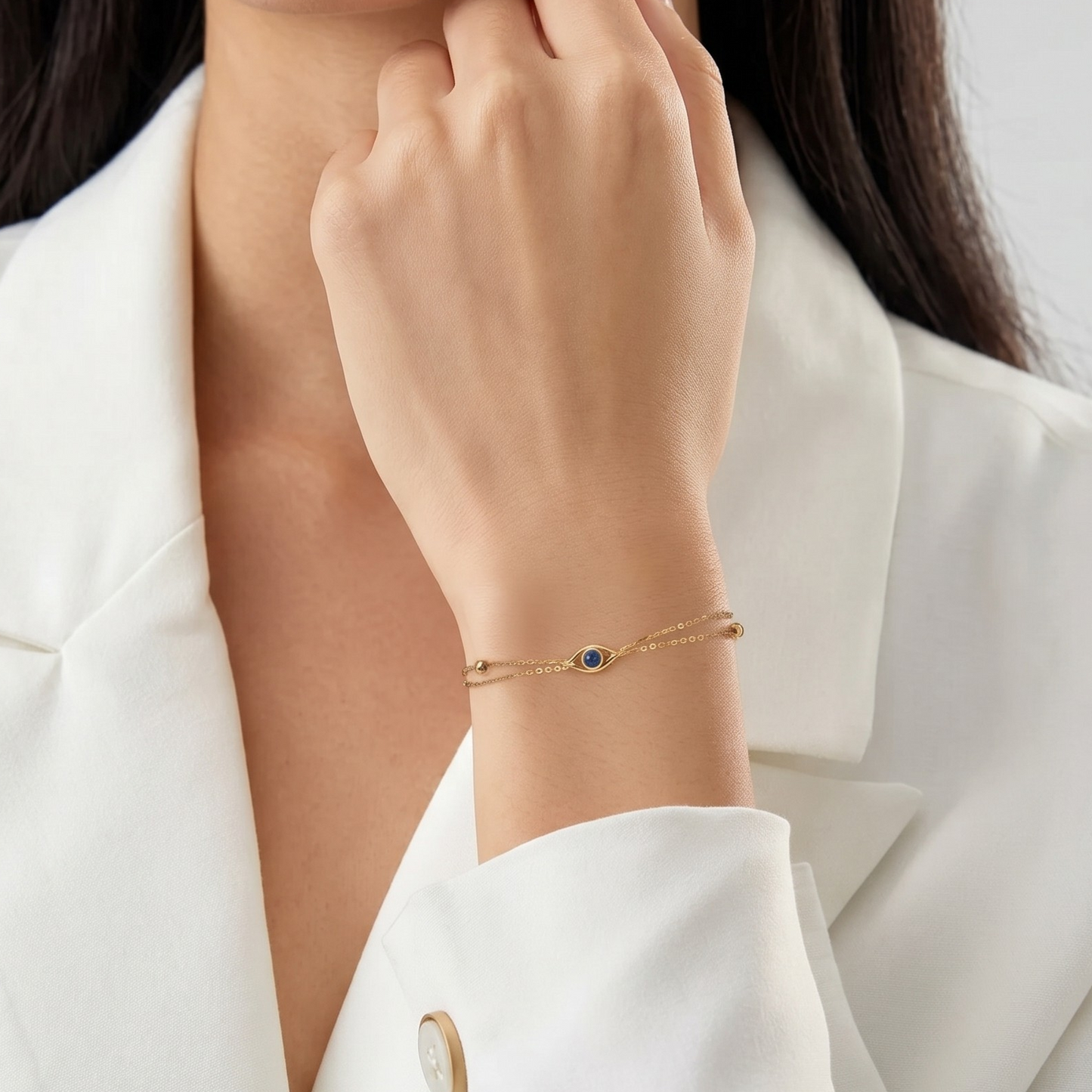 Detailed shot showcasing the elegant double chain structure and delicate gold bead accents for a modern layered look.