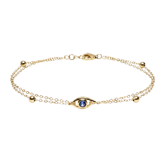Full product image of the Lea S925 sterling silver bracelet with 14K gold plating, featuring a sleek evil eye design and double chain detail.