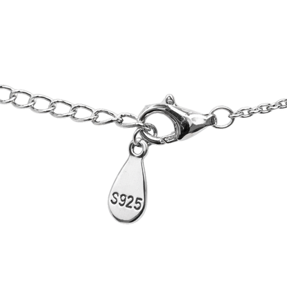 Angled view of Lucy sterling silver jewelry necklace highlighting the elegant interlocking design and subtle zircon sparkle, perfect for layering or wearing alone.