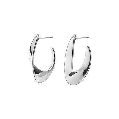 Side profile view showcasing the rhodium plated Luna Curve hoops crafted from S925 sterling silver jewelry. The smooth crescent silhouette and reflective silver finish emphasize the modern, elegant design.