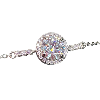 Close-up of the 1 carat moissanite stone showcasing exceptional VV1/VV2 clarity, D color brilliance, and fine halo craftsmanship in sterling silver.