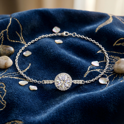 Side profile highlighting the delicate chain design and high-polish rhodium plated finish of this luxury sterling silver bracelet.