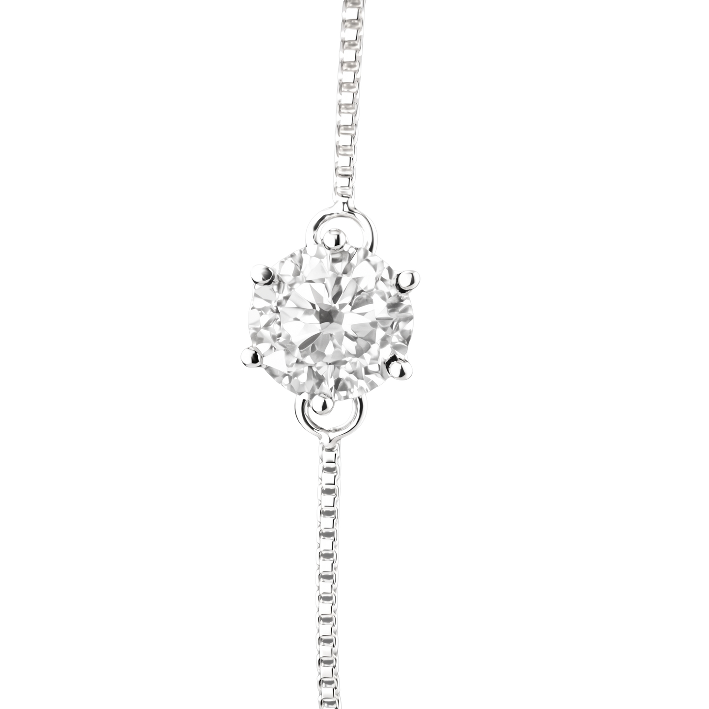 Macro close-up of the 1 carat round brilliant moissanite, emphasizing its fire, brilliance, and premium prong setting craftsmanship.