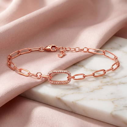 Lightweight and elegant 7-inch silver bracelet with zircon centerpiece ideal for stacking or solo wear.