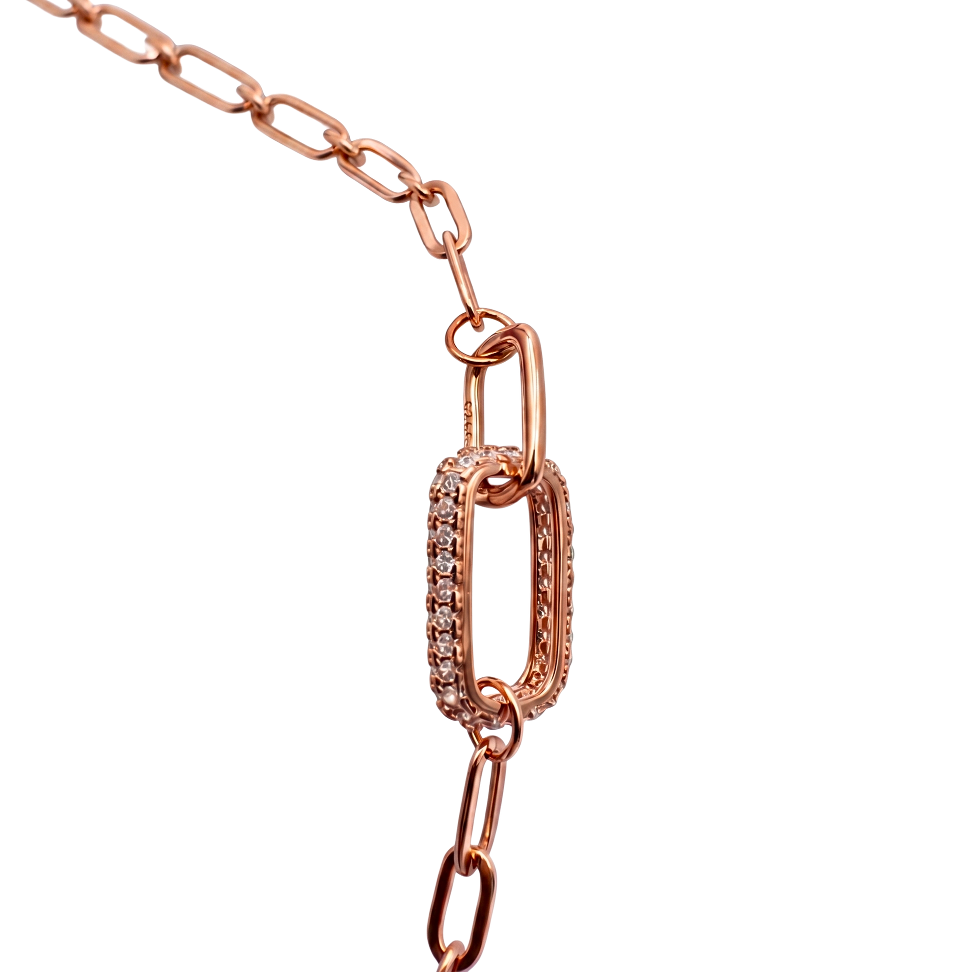 Detailed close-up of the sparkling zircon-studded oval link on this rose gold plated sterling silver bracelet.