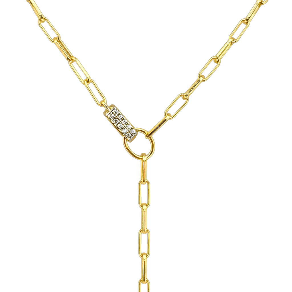 Close-up detail of zircon stones set in the paperclip drop pendant on this sterling silver 14K gold plated necklace. Fine jewelry craftsmanship and sparkle.