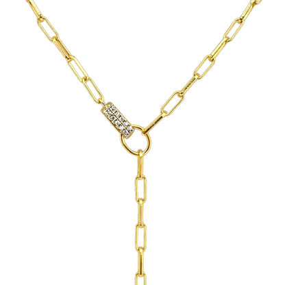 Close-up detail of zircon stones set in the paperclip drop pendant on this sterling silver 14K gold plated necklace. Fine jewelry craftsmanship and sparkle.