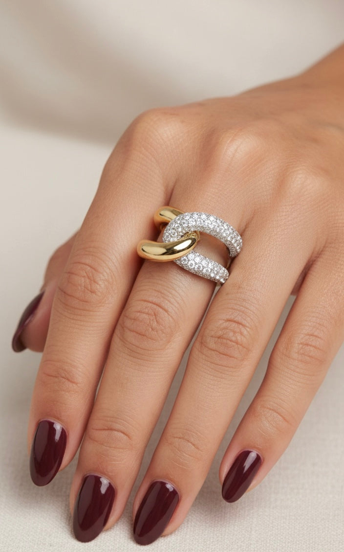 Detailed macro shot of the pavé-set zircon stones on rhodium plated sterling silver band.