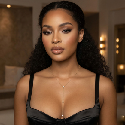 Lifestyle view of Angela sterling silver necklace with 14k gold plating, highlighting the elegant lariat drop and bezel set zircon stones fine jewelry design.