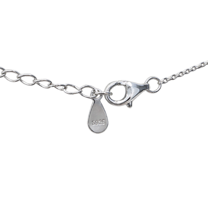 Side angle of Anna silver necklace showing interlocking circle design in sterling silver jewelry with polished and zircon accents.