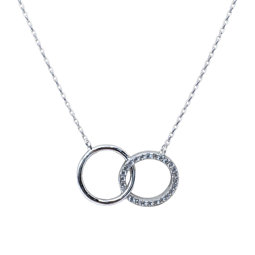 Close-up detail of zircon stones on rhodium plated sterling silver circle, highlighting sparkle and fine jewelry craftsmanship.