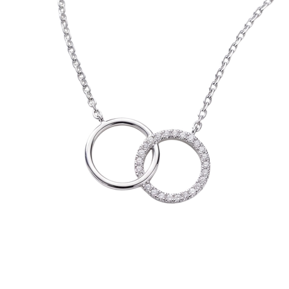 Close-up detail of zircon stones on rhodium plated sterling silver circle, highlighting sparkle and fine jewelry craftsmanship.