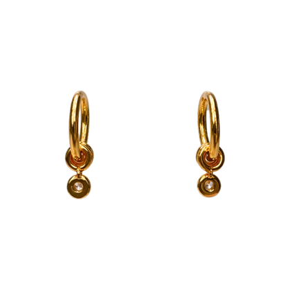 Pair view of Barbara fine jewelry hoop earrings, showcasing their polished gold finish, balanced proportions, and zircon detail.
