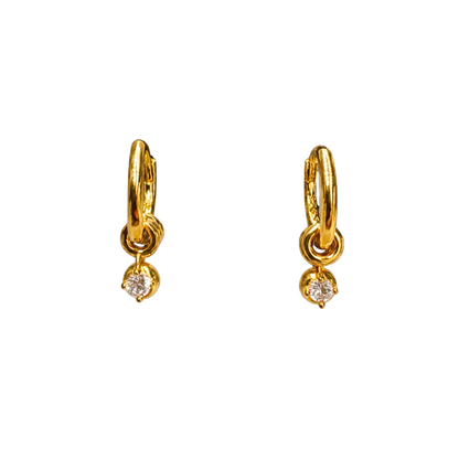 Close-up of 18K gold plated sterling silver earrings, highlighting the sculpted hoop texture and sparkling zircon charm.