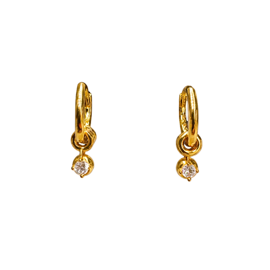 Close-up of 18K gold plated sterling silver earrings, highlighting the sculpted hoop texture and sparkling zircon charm.