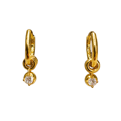 Close-up of 18K gold plated sterling silver earrings, highlighting the sculpted hoop texture and sparkling zircon charm.