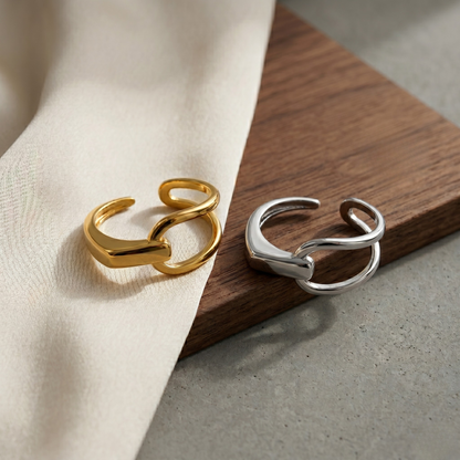 Elegant close-up of Caroline dual wrap resizable ring in sterling silver, featuring a polished modern silhouette with timeless minimalist luxury.