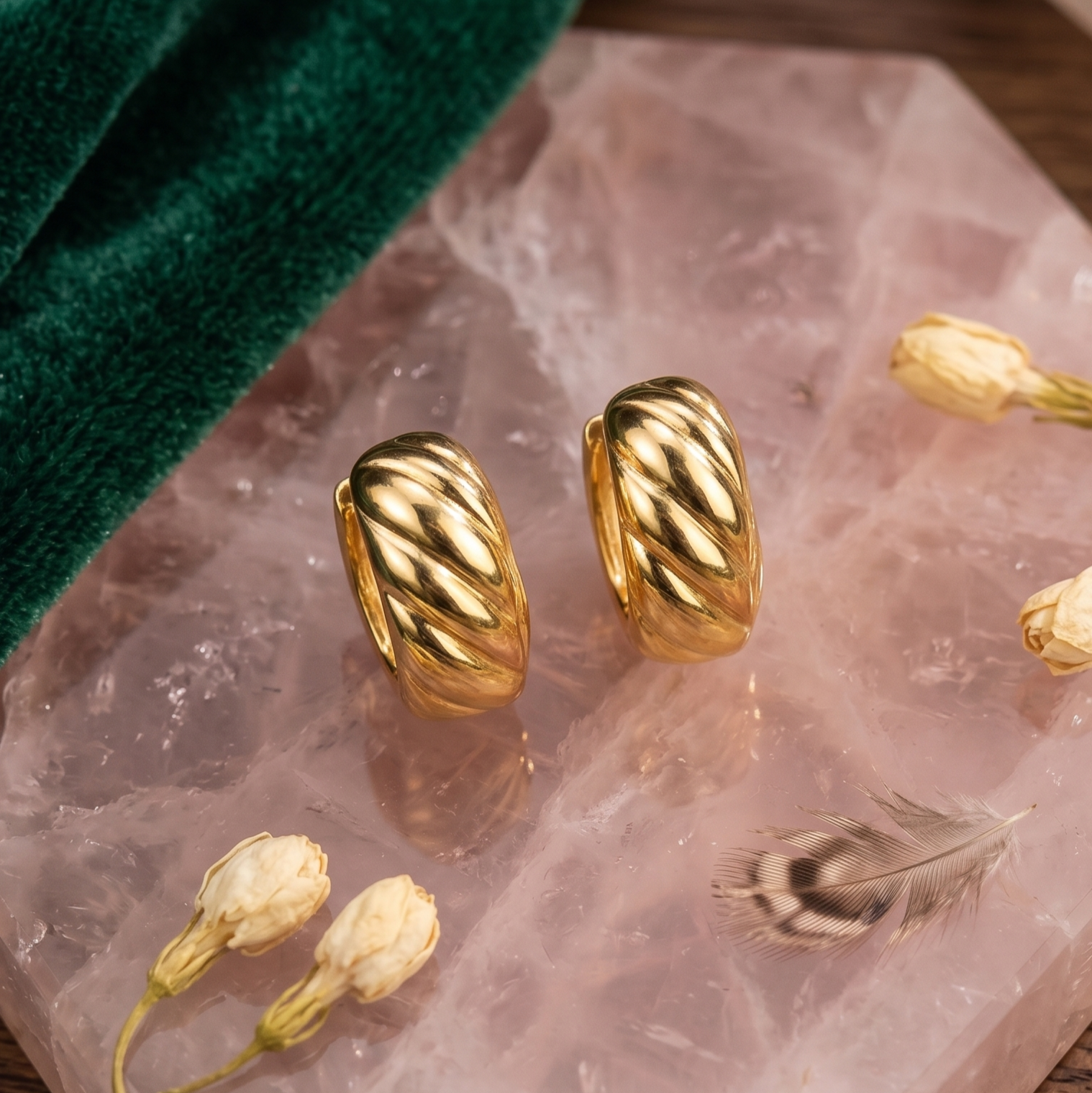 Detailed image of S925 sterling silver vintage earrings with gold plating and organic leaf-inspired texture.