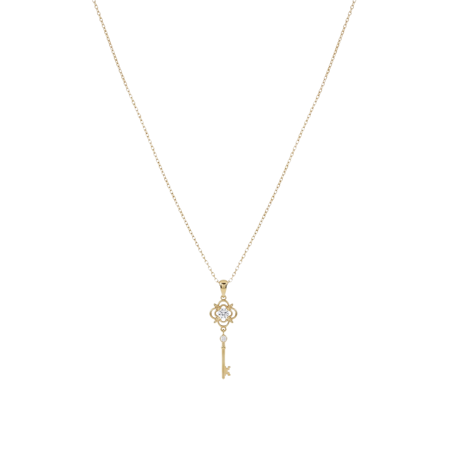 Front view of Clavis sterling silver necklace with 14k gold plating, featuring a zircon clover and key pendant jewelry design.