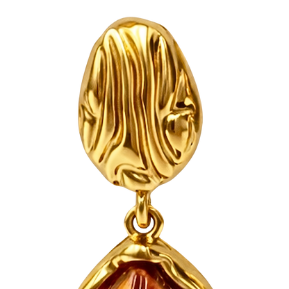 Detailed product image of textured gold earrings made from durable stainless steel jewelry, highlighting a rich amber-tone vintage stone for a bold vintage earrings aesthetic.