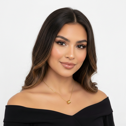 Emily elegant spiral pendant necklace crafted in sterling silver and finished with 18K gold plating. Timeless minimalist jewelry.