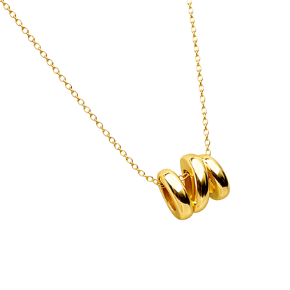 Emily minimalist gold plated sterling silver necklace featuring a sleek spiral pendant. Elegant contemporary silver jewelry.