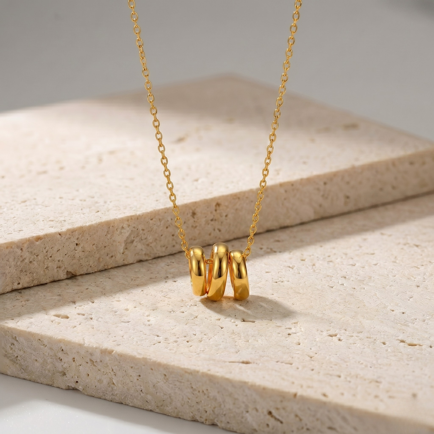 Emily modern spiral pendant necklace crafted from sterling silver S925 with radiant 18K gold plating. A chic minimalist necklace designed for elegant everyday style.