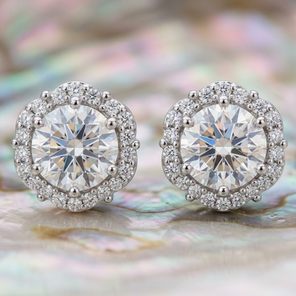 Evie 1 carat moissanite halo stud earrings crafted in S925 sterling silver with rhodium plated finish, featuring D color VVS1 moissanite and timeless lab grown diamond brilliance.