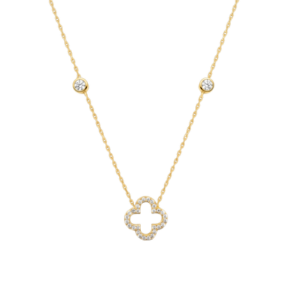 Close-up of the clover pendant crafted from sterling silver, 14K gold plated, and set with sparkling zircon stones. A fine jewelry necklace designed for elegant everyday wear.