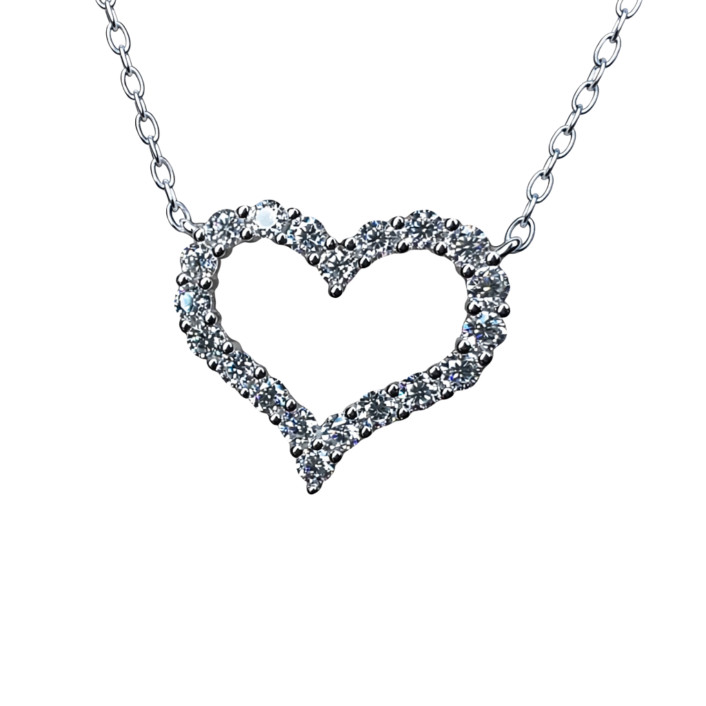 Close-up of heart pendant showing pavé moissanite stones, sterling silver base, rhodium plating, and brilliant diamond-like sparkle.