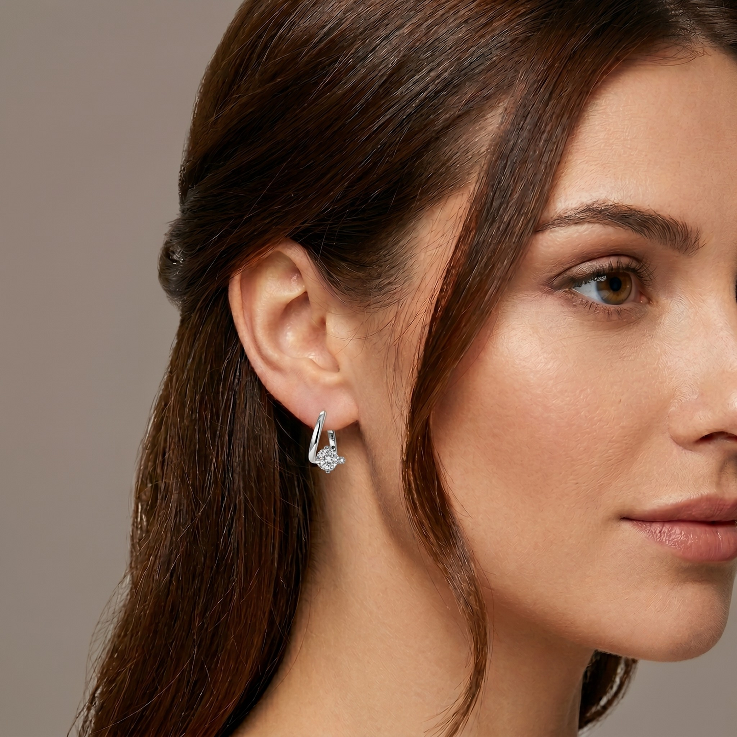 Close-up of Ava silver earrings showing precision cut D color moissanite, rhodium plated sterling silver fine jewelry with exceptional sparkle and clarity.
