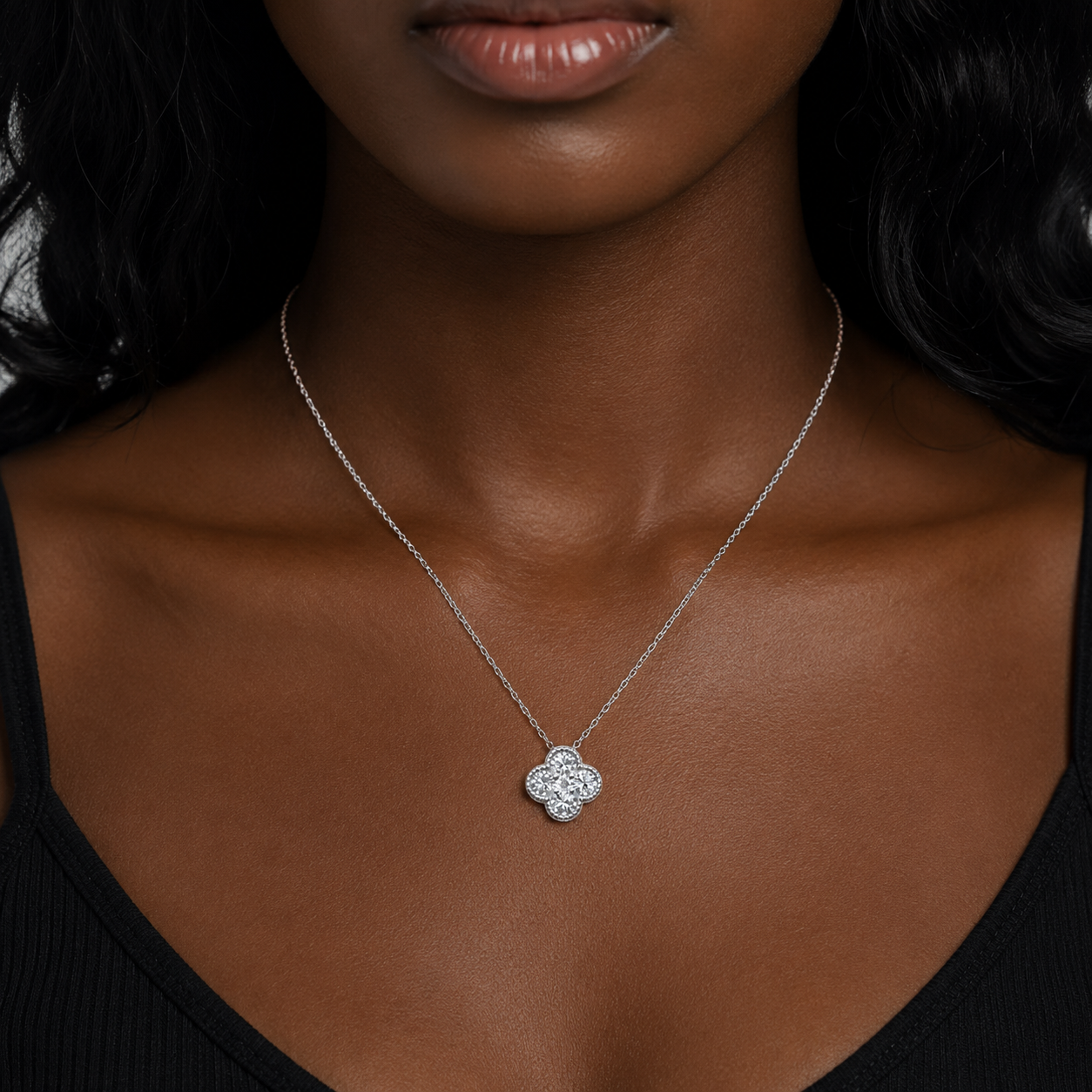 Luxury sterling silver clover necklace with brilliant zircon stones, rhodium plated for durability and hypoallergenic wear.