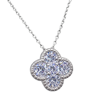 Close-up of zircon stones set in a four-leaf clover pendant made of rhodium plated sterling silver S925.