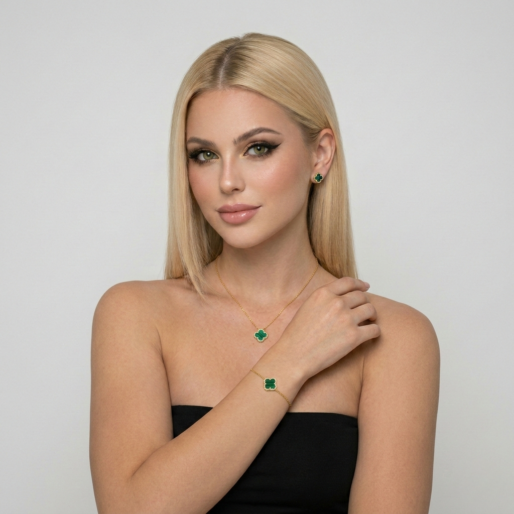 Green malachite clover jewelry set with necklace, bracelet, and stud earrings made from S925 sterling silver and 18K gold plating. Luxury clover jewelry set with sparkling zircon stones.