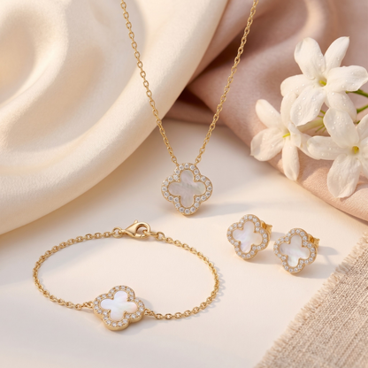 Matching clover necklace, bracelet, and stud earrings jewelry set crafted from S925 sterling silver and 18K gold plating. Classic women’s jewelry set with elegant clover design.