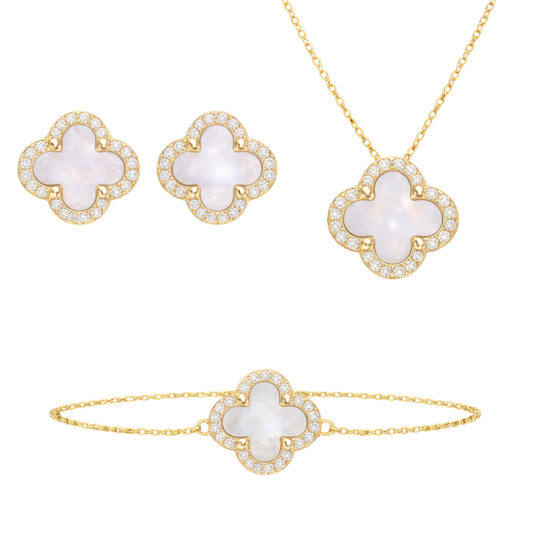 Matching clover necklace, bracelet, and stud earrings jewelry set crafted from S925 sterling silver and 18K gold plating. Classic women’s jewelry set with elegant clover design.