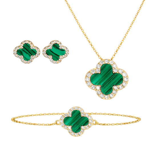 Stephanie clover jewelry set made of S925 sterling silver with 18K gold plating, featuring matching necklace, bracelet, and stud earrings with zircon accents. Elegant sterling silver jewelry set for women.