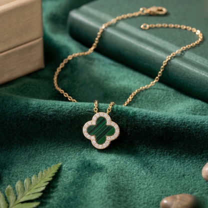 Elegant green clover pendant necklace made of sterling silver, 18k gold plated finish and zircon sparkle.