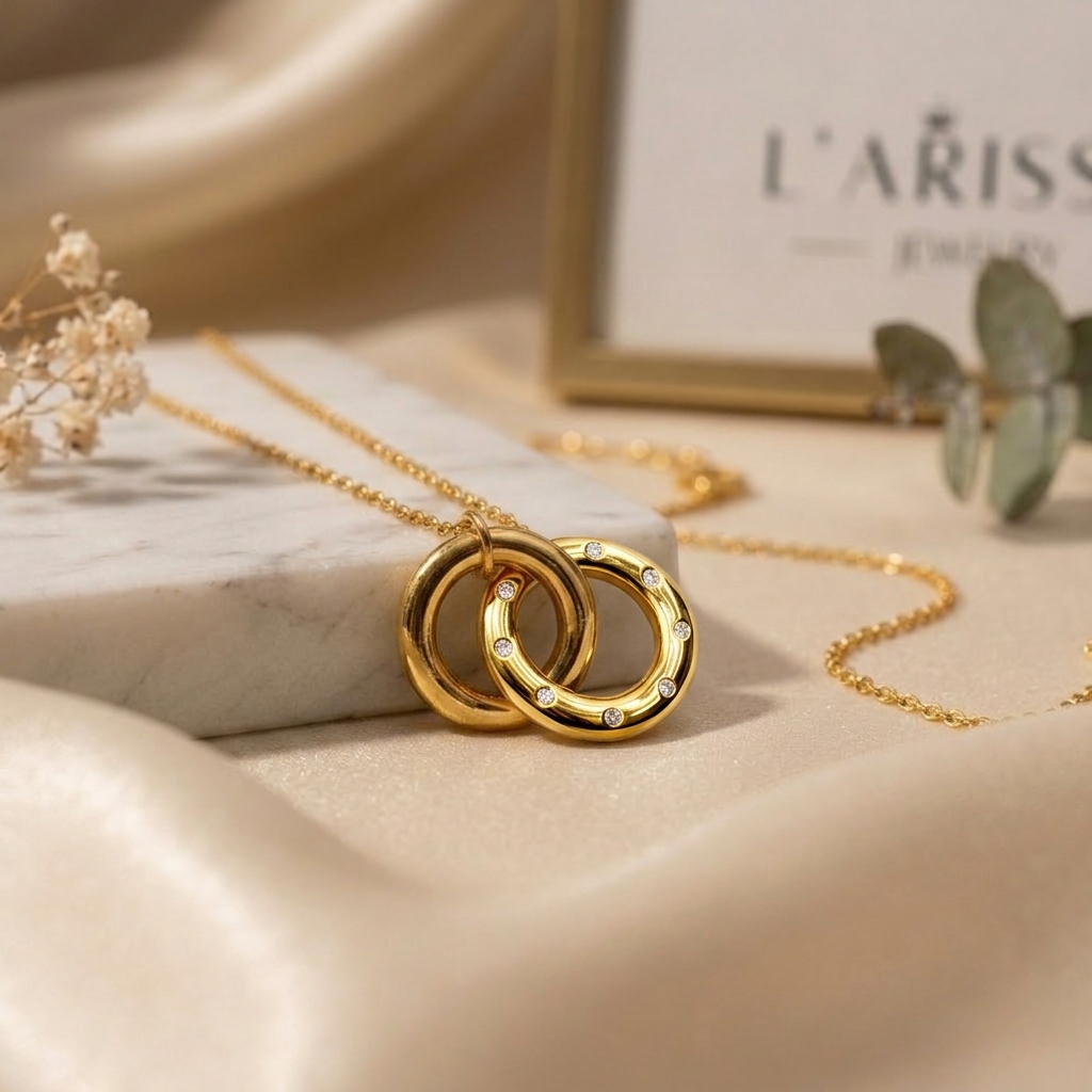 Close-up view of the Valentina interlocking rings necklace crafted from sterling silver with 18K gold plating and sparkling zircon accents, highlighting its elegant circular design and timeless jewelry craftsmanship.