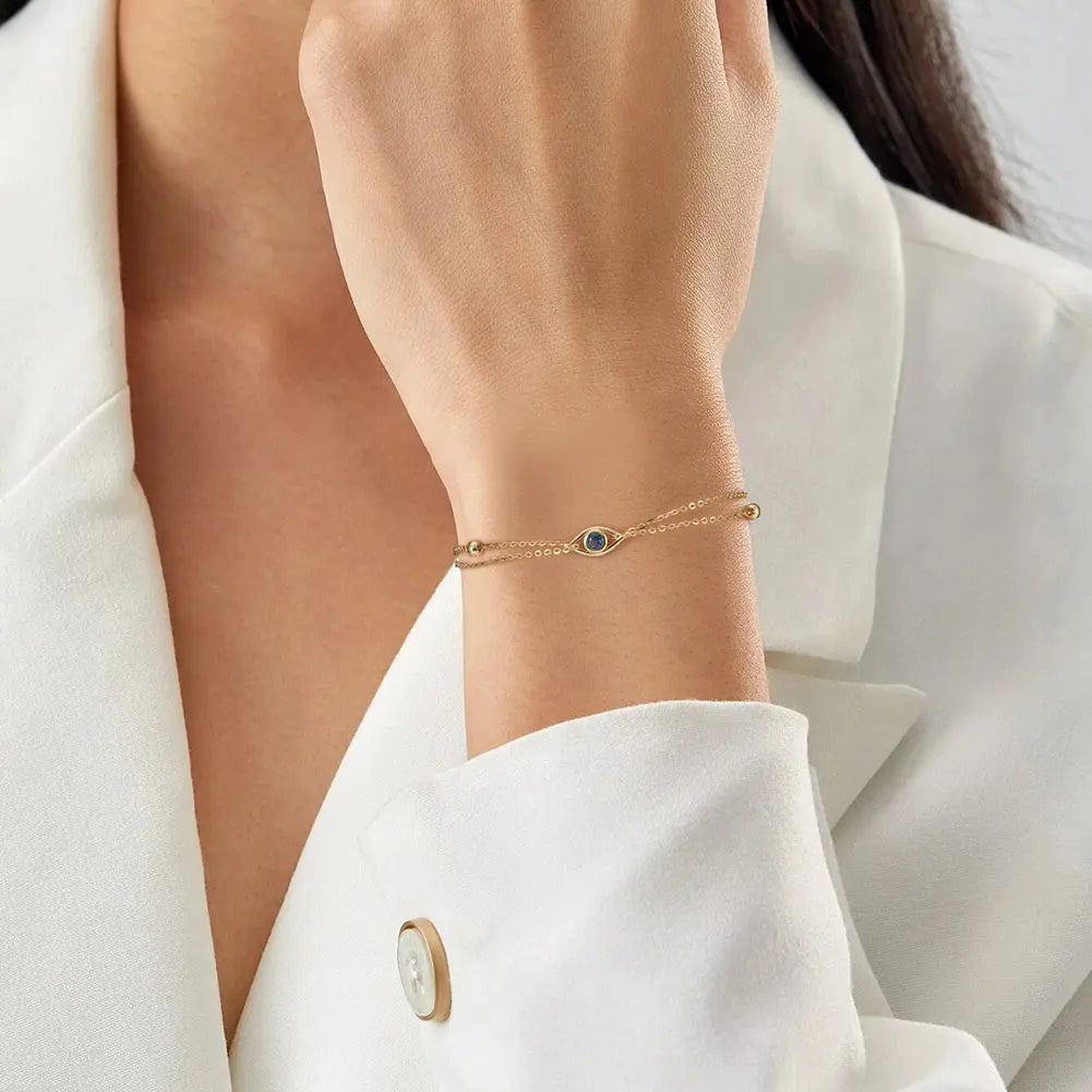 Detailed shot showcasing the elegant double chain structure and delicate gold bead accents for a modern layered look.